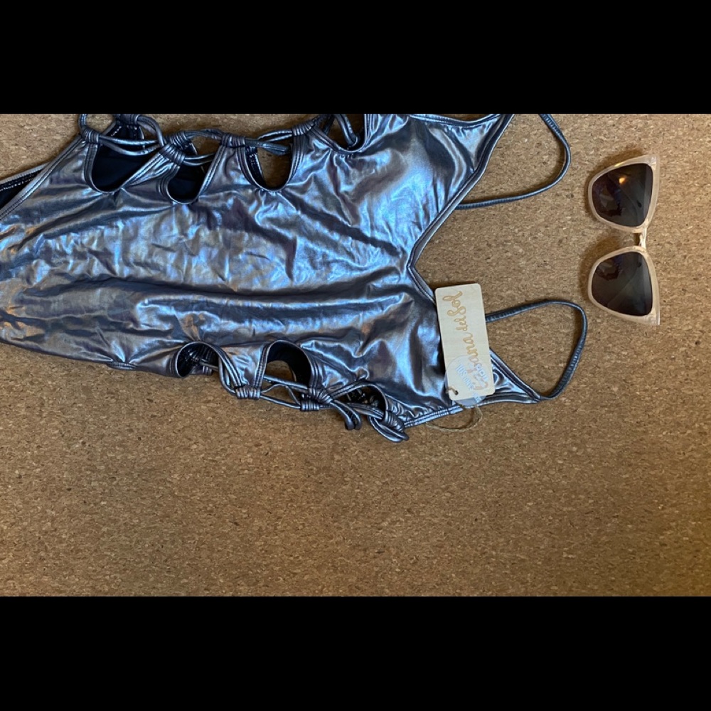 Never worn silver cut out bathing suit